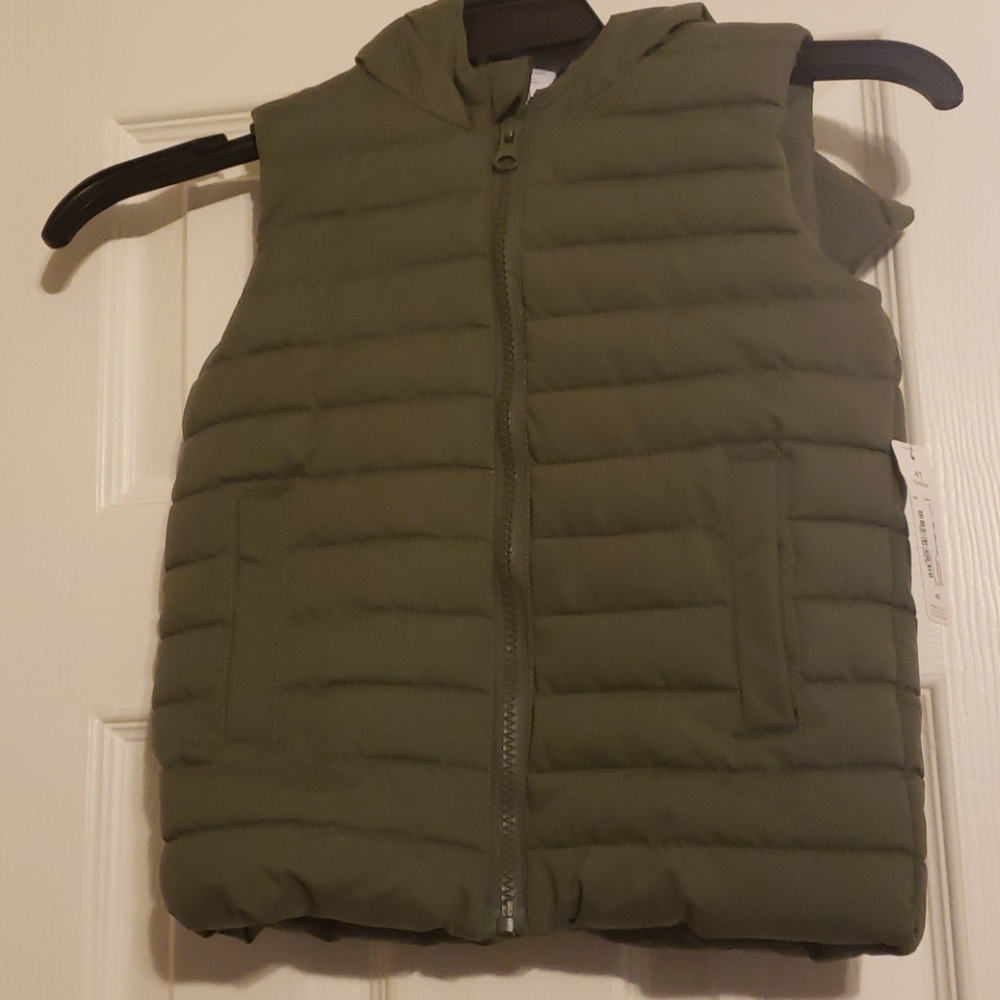 Vest with hood attached